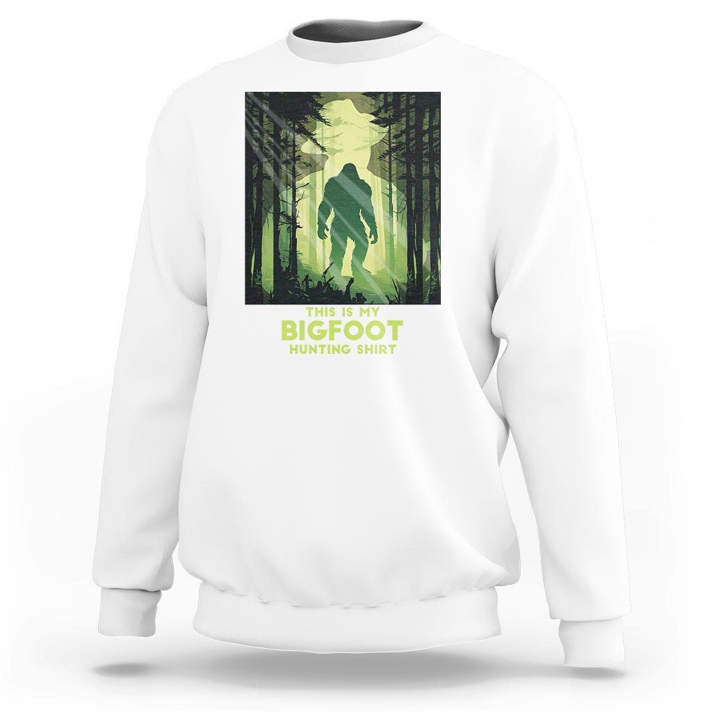 White sweatshirt with front Bigfoot hunting graphic and crew neck cuffs