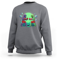 Charcoal gray crewneck sweatshirt with boxing Bigfoot vs alien graphic on the front.