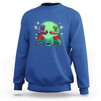 Royal blue crewneck sweatshirt with boxing Bigfoot vs alien graphic on the front.