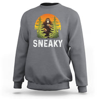 Charcoal crewneck sweatshirt with Bigfoot graphic and "SNEAKY" text