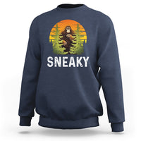 Navy crewneck sweatshirt with Bigfoot graphic and "SNEAKY" text
