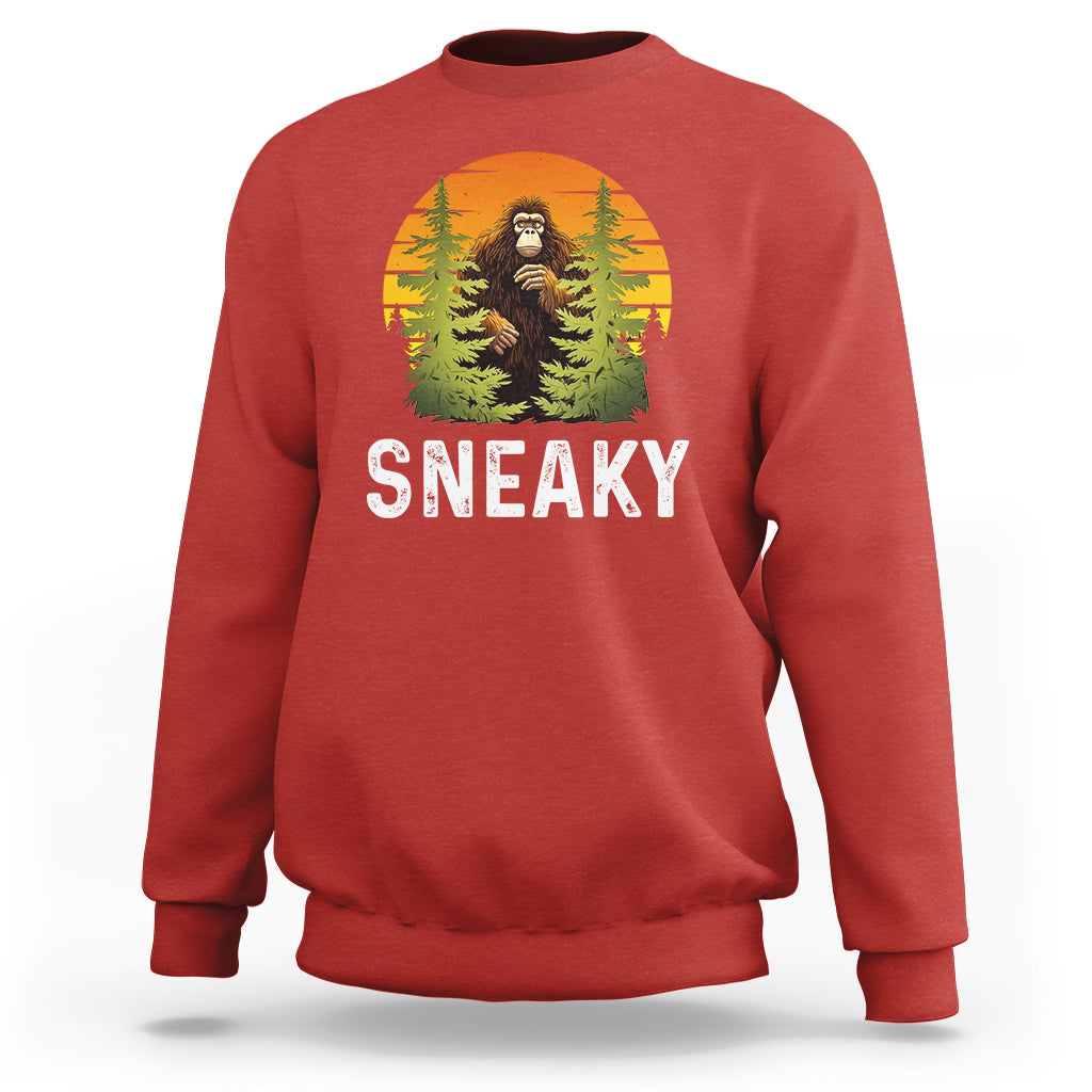 Red crewneck sweatshirt with Bigfoot graphic and "SNEAKY" text