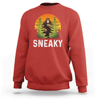 Red crewneck sweatshirt with Bigfoot graphic and "SNEAKY" text