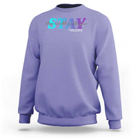 Lavender crewneck sweatshirt with colorful call or text 988 support graphic on chest