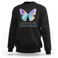 Black crewneck sweatshirt with rainbow butterfly and inspirational suicide prevention text