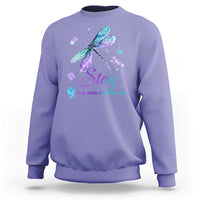 Violet crewneck sweatshirt with dragonfly graphic and “Stay” message, long sleeves