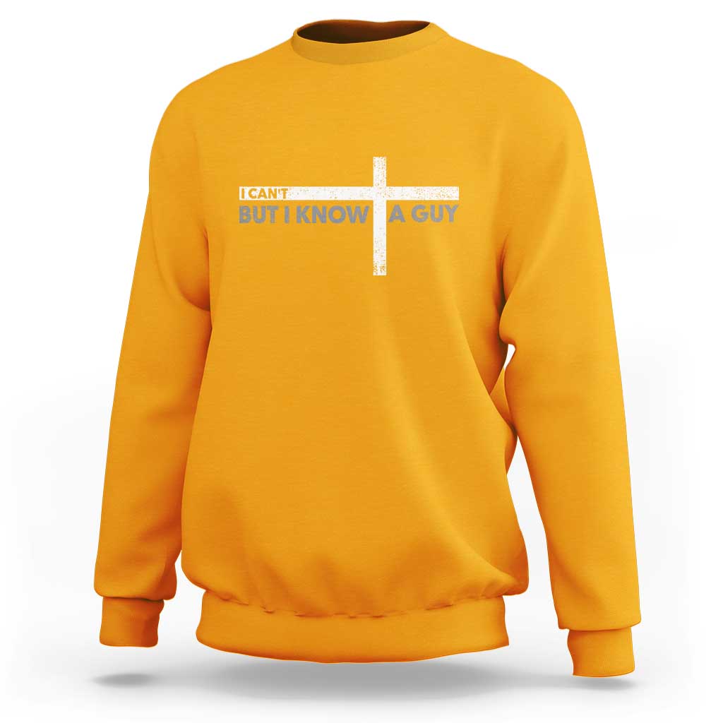 Gold sweatshirt with cross graphic and text design at the chest