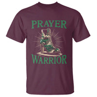 Maroon T-shirt with camo heels graphic and "PRAYER WARRIOR" text.