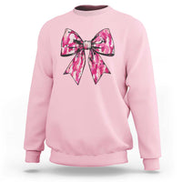 Girl's camouflage bow sweatshirt in light pink with pink camouflage bow graphic at chest