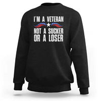 Black sweatshirt with “I’m a Veteran” slogan and patriotic star graphic on front