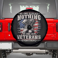 Black round spare tire cover featuring 'We Owe Our Veterans Everything' design