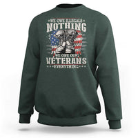 Veterans Day sweatshirt in dark forest green with patriotic veteran graphic print.