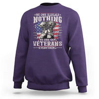 Veterans Day sweatshirt in purple with patriotic veteran graphic print.