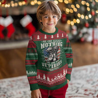 Kids crewneck ugly Christmas sweater in green with red and white holiday pattern and front graphic