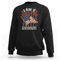 Veteran pride sweatshirt in black with veteran emblem, flag and slogan graphic.