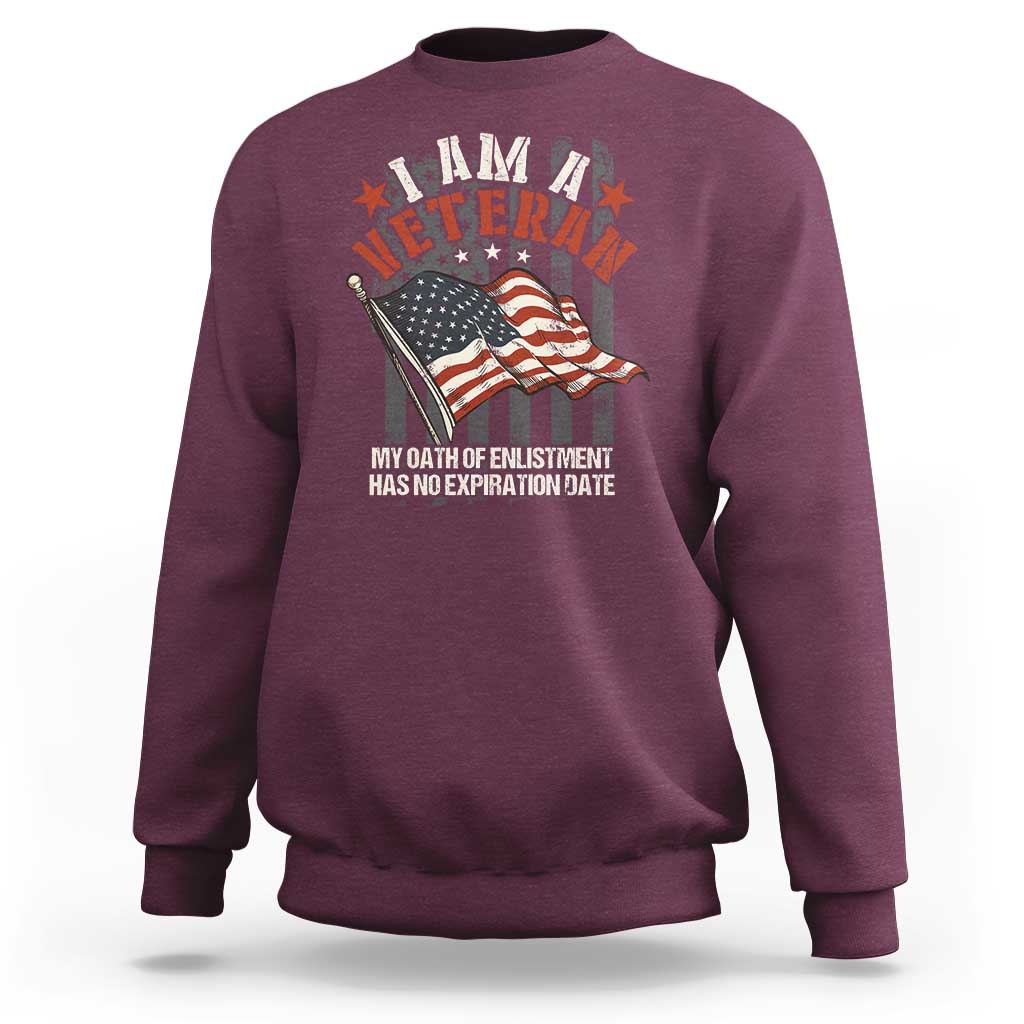 Veteran pride sweatshirt in maroon with veteran emblem, flag and slogan graphic.