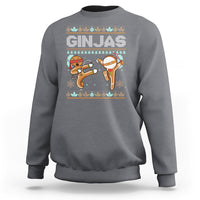 Charcoal gray sweatshirt with festive ninja gingerbread graphic on front