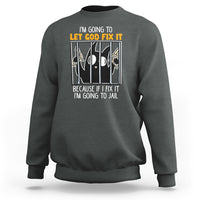 Dark heather crewneck sweatshirt with front text graphic: “LET GOD FIX IT”