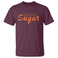 Maroon crew-neck T-shirt with orange 'Brown Sugar' logo on front