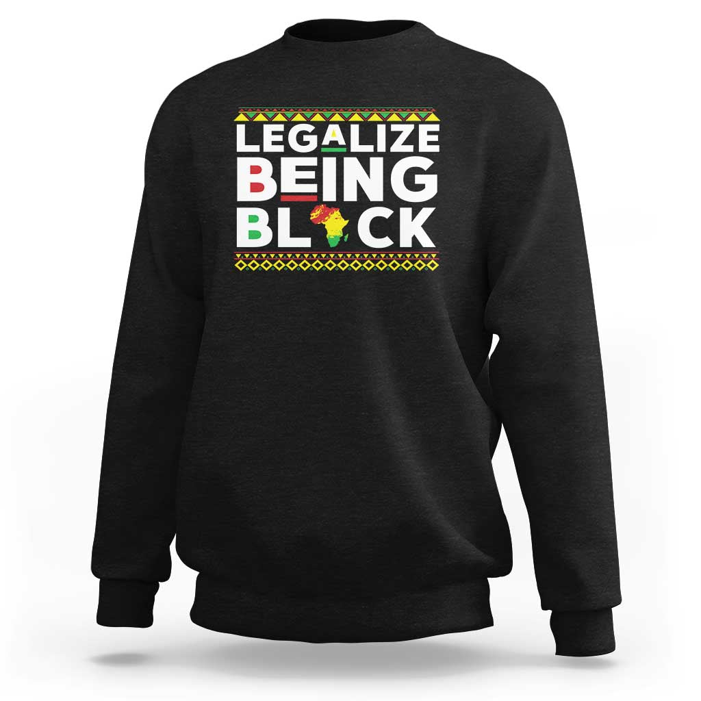 Black sweatshirt with “Legalize Being Black” graphic across the chest.