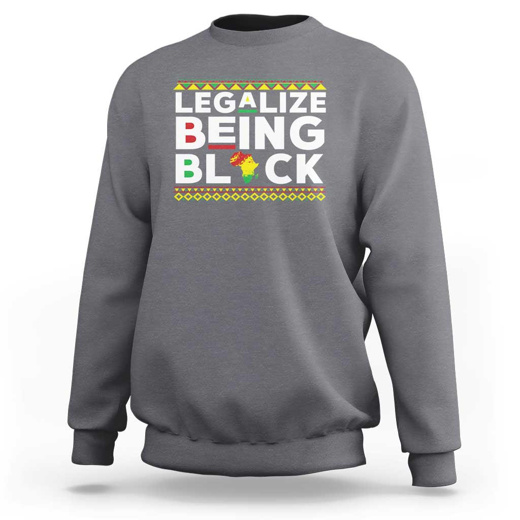 Heather gray sweatshirt with “Legalize Being Black” graphic across the chest.