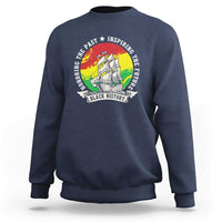 Navy crewneck sweatshirt with front circular rainbow ship graphic