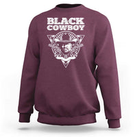 Maroon crewneck sweatshirt with "Black Cowboy" graphic on the chest