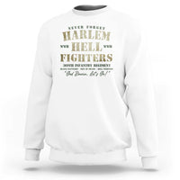 White crewneck sweatshirt with "Harlem Hell Fighters" graphic on front.