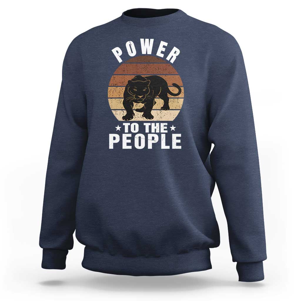 Navy sweatshirt with “POWER TO THE PEOPLE” panther graphic on front