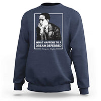 Navy crewneck sweatshirt with front portrait graphic and quote text