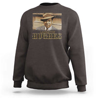 Dark chocolate sweatshirt with “Langston Hughes” portrait graphic on the front.