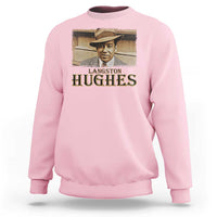 Light pink sweatshirt with “Langston Hughes” portrait graphic on the front.