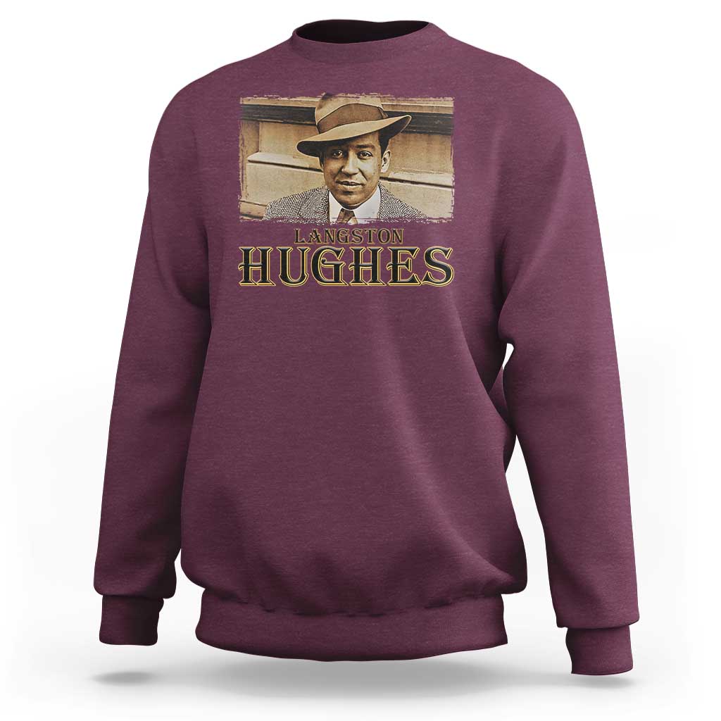 Maroon sweatshirt with “Langston Hughes” portrait graphic on the front.