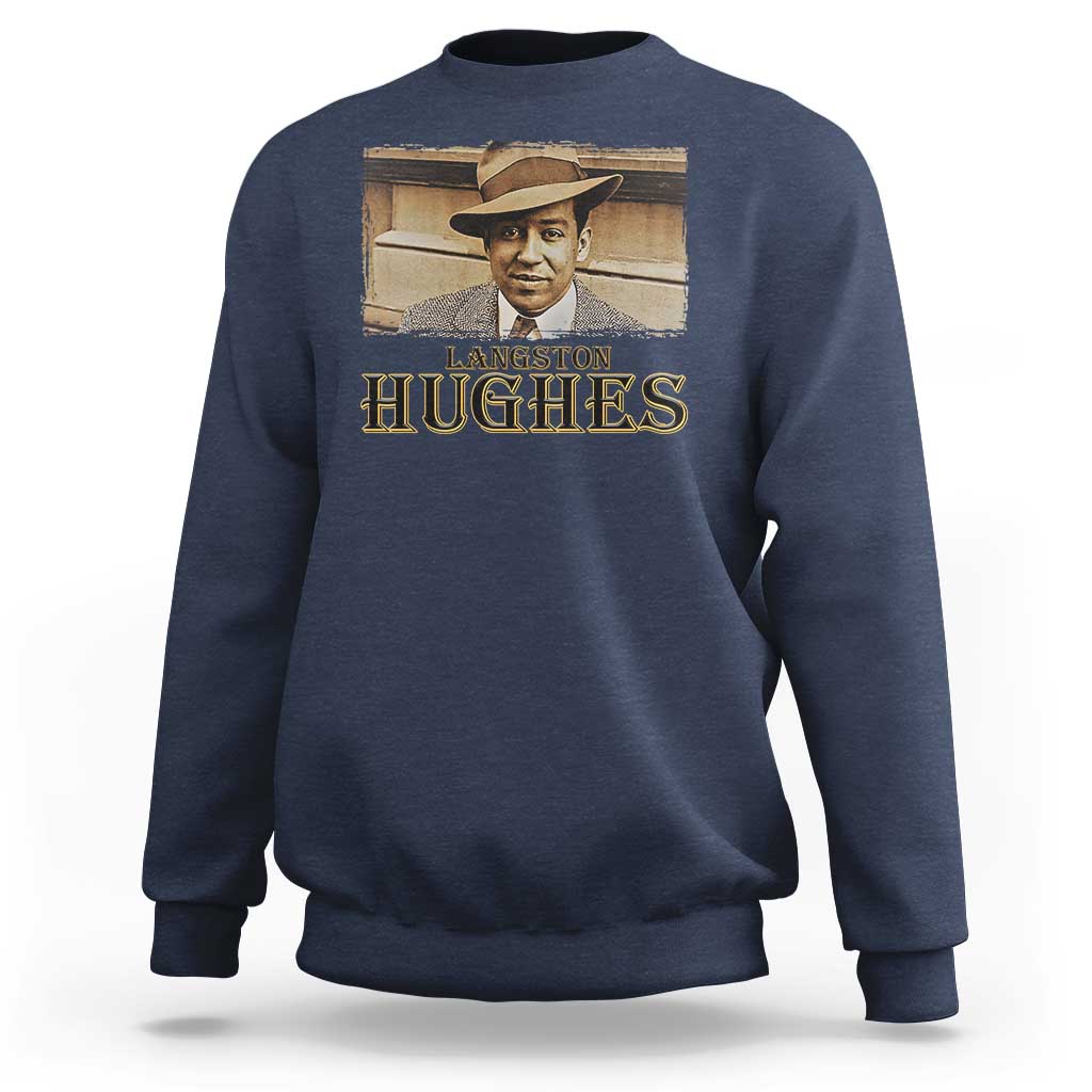 Navy sweatshirt with “Langston Hughes” portrait graphic on the front.