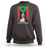Dark chocolate crewneck sweatshirt with Arturo Schomburg front graphic, ribbed cuffs and hem