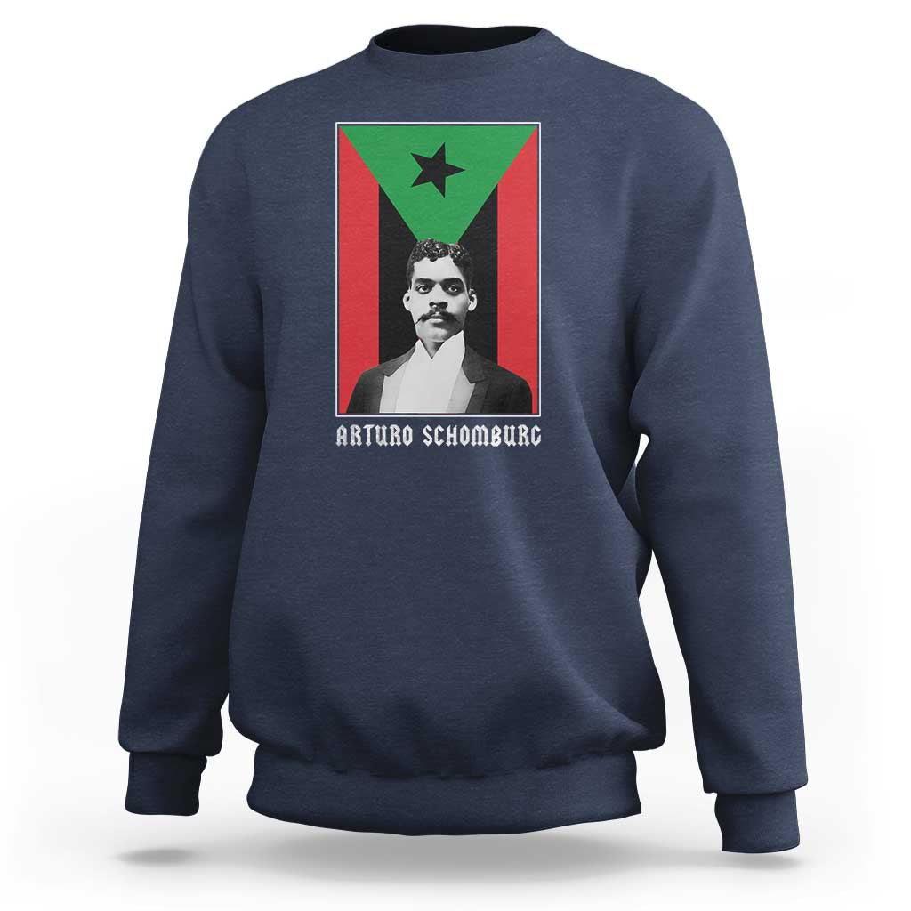 Navy crewneck sweatshirt with Arturo Schomburg front graphic, ribbed cuffs and hem