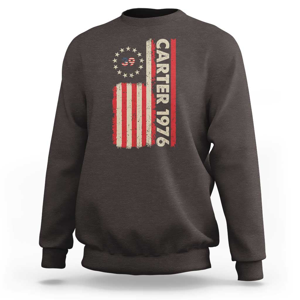 Dark chocolate crewneck sweatshirt with vertical “Carter 1976” and American flag graphic