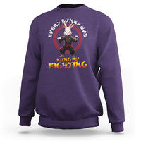 Purple crewneck sweatshirt with bunny kung fu graphic and bold 'KUNG FU FIGHTING' text