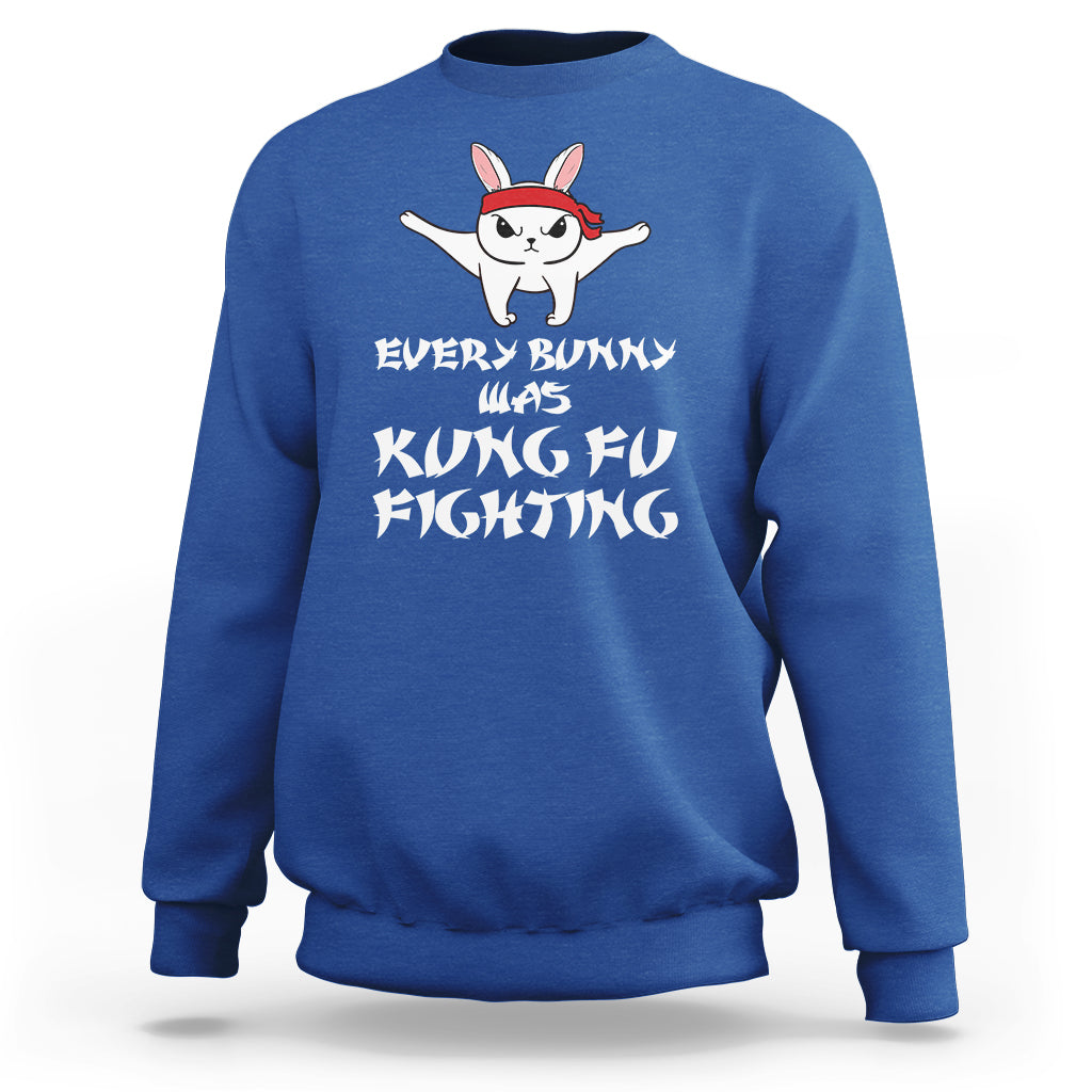 Royal blue sweatshirt with bunny graphic and "Every Bunny is Kung Fu Fighting" print