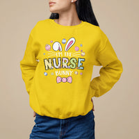 Daisy yellow crewneck sweatshirt with 'I'm the Nurse Bunny' easter bunny graphic