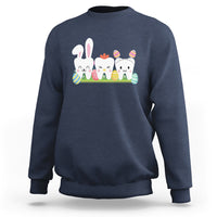 Navy sweatshirt with bunny and colorful tooth graphic across the chest