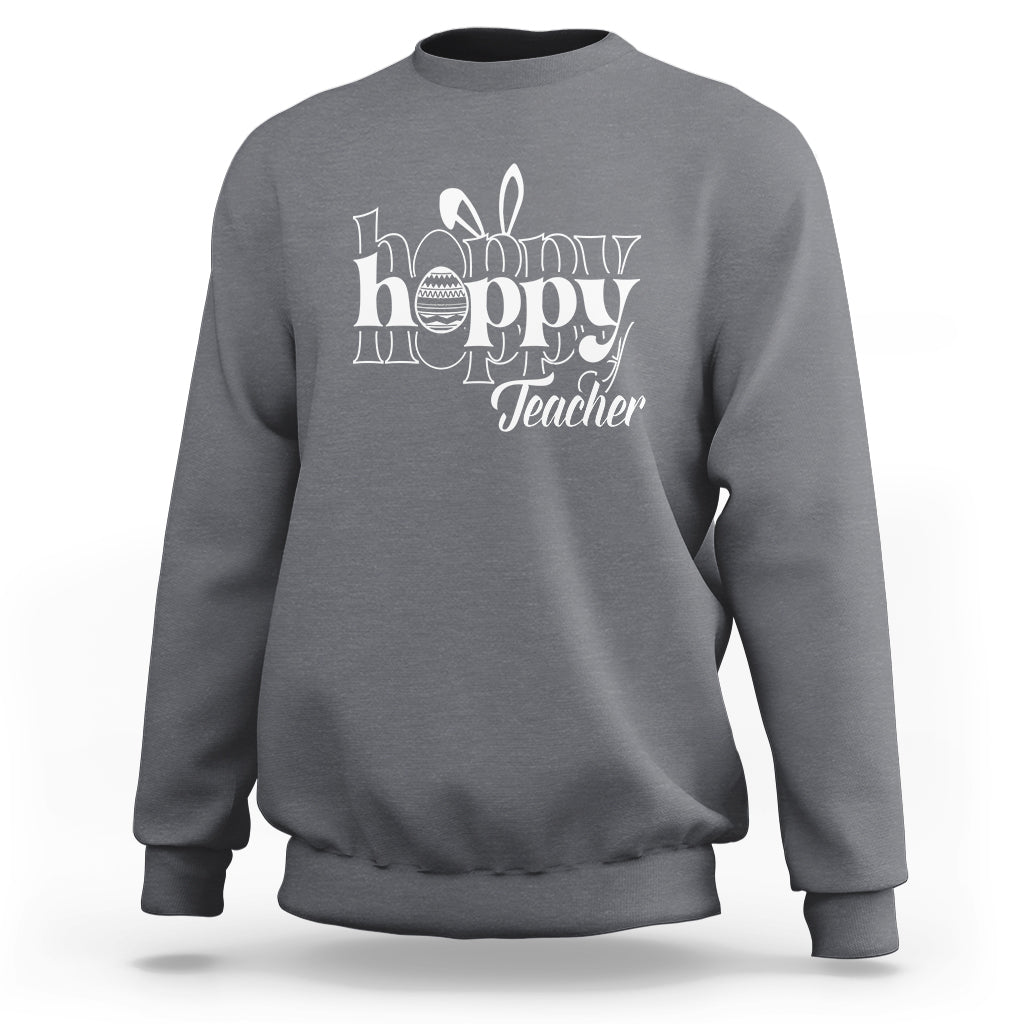 Charcoal gray crewneck sweatshirt with white “Happy Hoppy Teacher” bunny and egg graphic