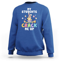 Royal blue sweatshirt with “My Students” and “Crack Me Up” chick graphic on chest