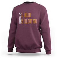 Funny crewneck sweatshirt, maroon with graphic text "HELLO" and "I'LL CUT YOU"