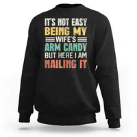 Men's crewneck sweatshirt in black with colorful front text graphic