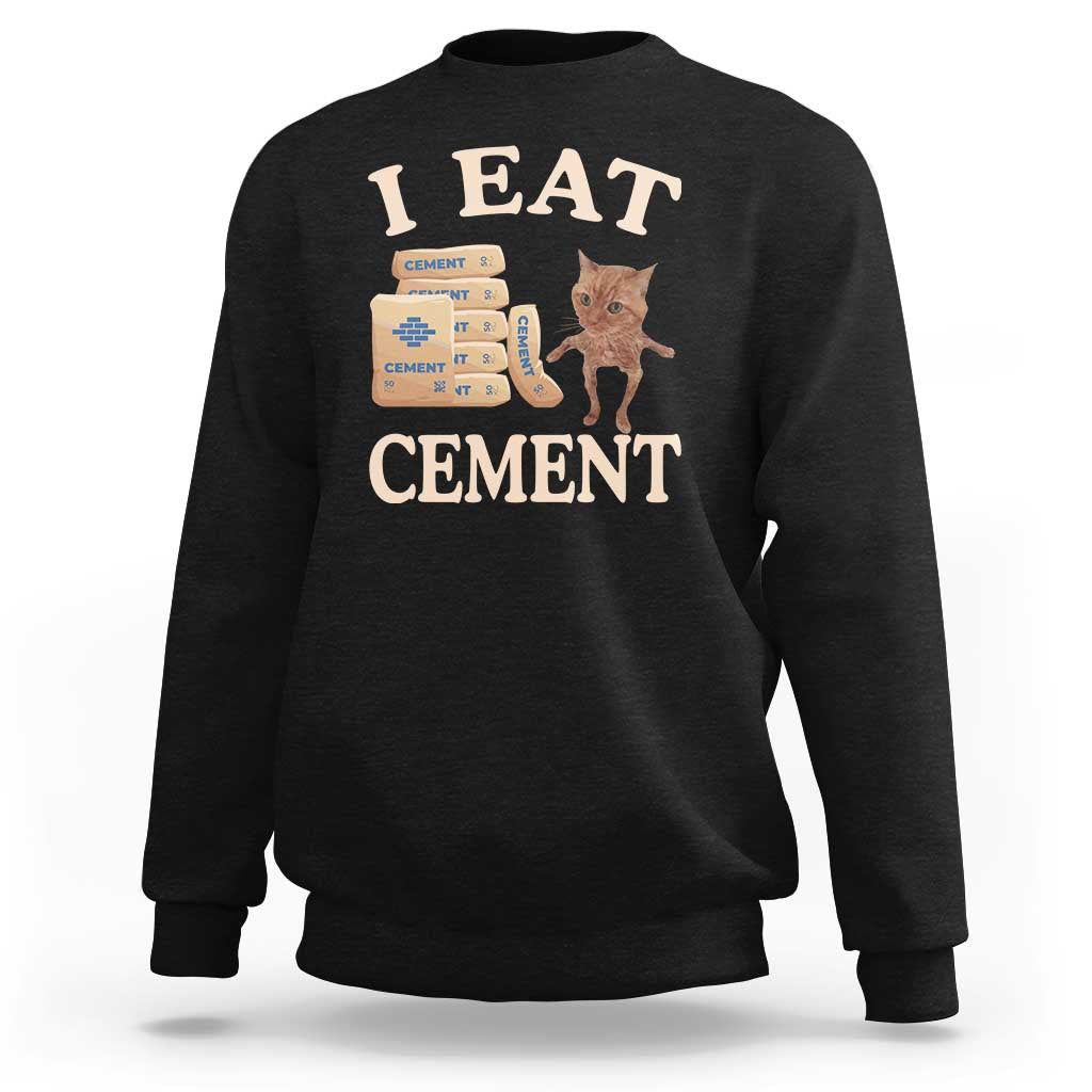 Black crewneck sweatshirt with 'EAT CEMENT' cat graphic on front