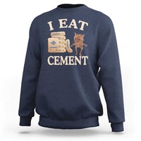 Navy crewneck sweatshirt with 'EAT CEMENT' cat graphic on front