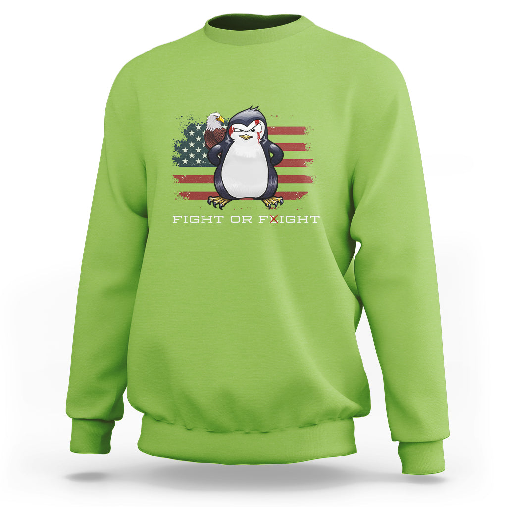 Lime green crewneck sweatshirt with penguin and U.S. flag graphic, “FIGHT OR FLIGHT” text.