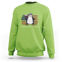 Lime green crewneck sweatshirt with penguin and U.S. flag graphic, “FIGHT OR FLIGHT” text.