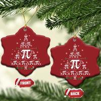 Red star-shaped Christmas ornament with pi symbols and holiday icons, hanging from gold strings.